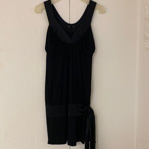V neck Bebe LBD . Size XS. Shirting at bust .